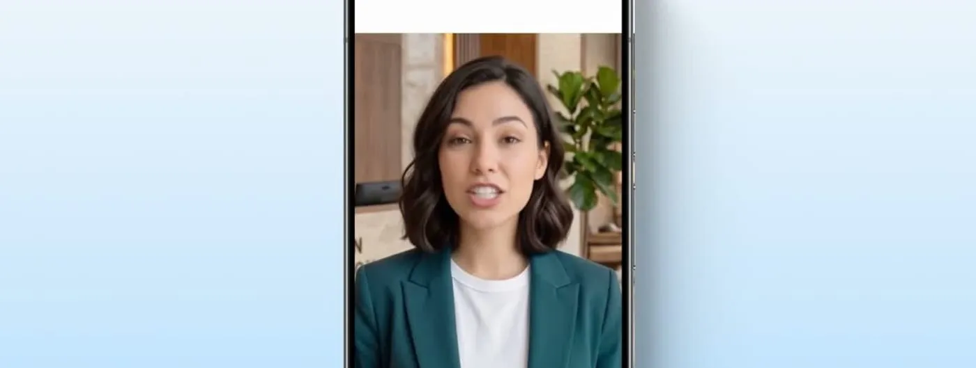 A phone screen shows a Gemini Live Avatar mid-sentence, a photorealistic AI-generated woman in a teal blazer speaking on a live video call interface.