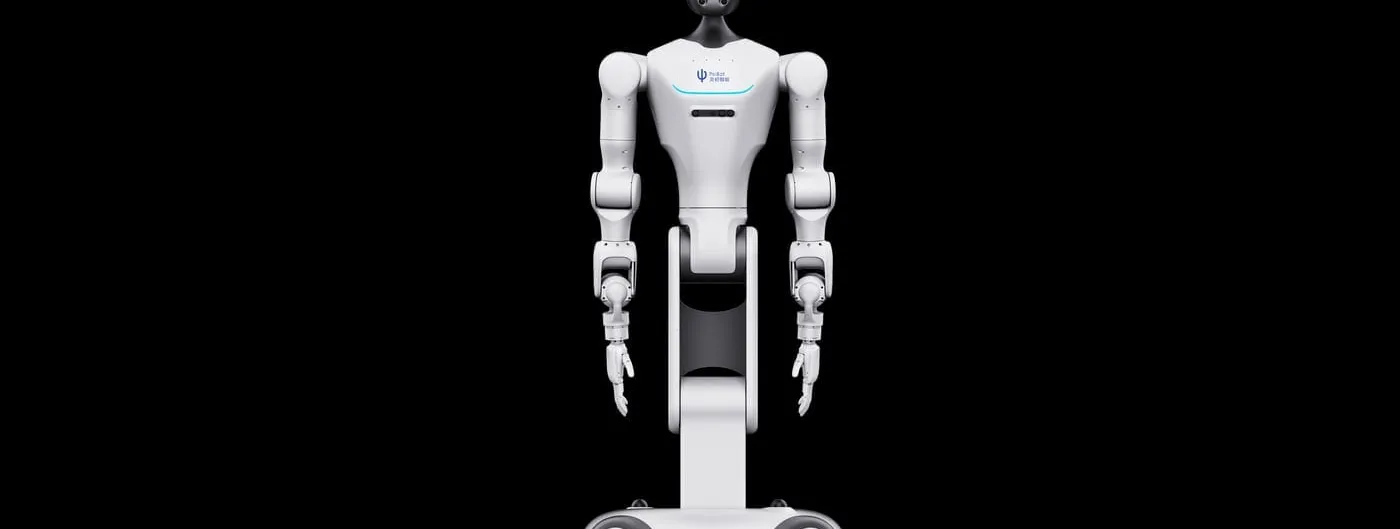 A white humanoid robot torso with two articulated arms and five-fingered hands, mounted on a wheeled base, photographed against a plain black background.