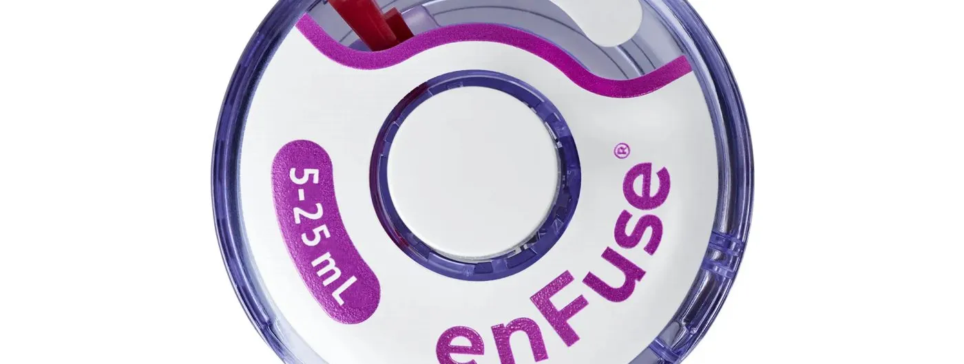 Product photograph of the purple-and-white enFuse wearable subcutaneous injection device used to deliver SER-252, seen from above with its capacity label and release tab visible.